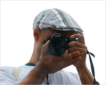 Guava Lab team member holding camera